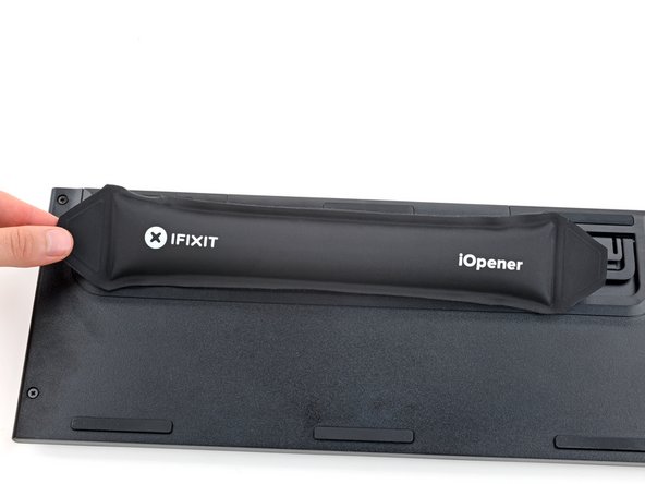 Logitech G915 TKL Battery Replacement, Remove the sticker: crwdns2935265:02crwdnd2935265:02crwdnd2935265:02crwdne2935265:0