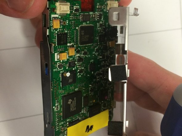 Creative Zen MicroPhoto Motherboard Replacement, Taking off the Back Cover of the Main Board: crwdns2935265:07crwdnd2935265:02crwdnd2935265:02crwdne2935265:0