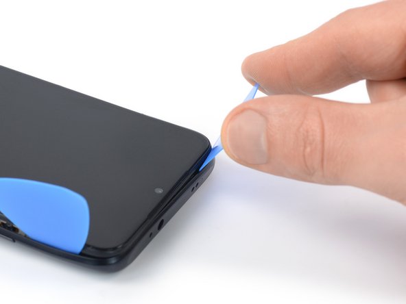 Xiaomi Redmi Note 9T Screen Replacement, Release the top edge plastic clips: crwdns2935265:08crwdnd2935265:02crwdnd2935265:02crwdne2935265:0