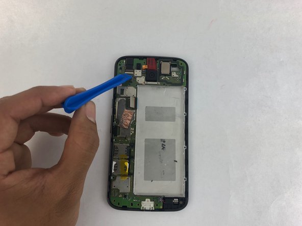 Use your spudger to pry up the front-facing camera and make sure it separates safely from the frame.