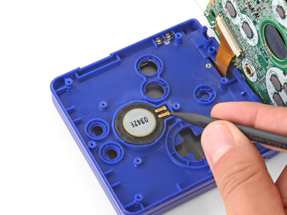 How to Reshell Your Game Boy Advance SP, Remove the speaker: crwdns2935265:012crwdnd2935265:01crwdnd2935265:03crwdne2935265:0
