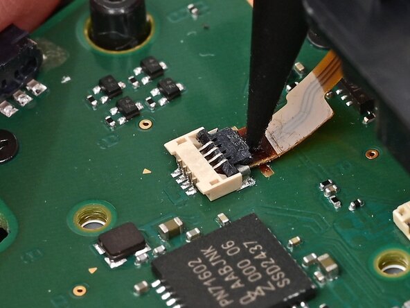 Joy-Con 2 (Right) Joystick Replacement, Disconnect the midframe: crwdns2935265:019crwdnd2935265:02crwdnd2935265:03crwdne2935265:0