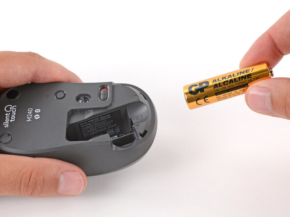 Logitech M240 Battery Replacement, Remove the battery: crwdns2935265:03crwdnd2935265:03crwdnd2935265:03crwdne2935265:0