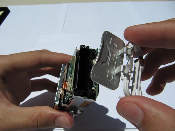 Kodak EasyShare LS743 Battery Door Replacement, Battery Door: crwdns2935265:06crwdnd2935265:02crwdnd2935265:02crwdne2935265:0