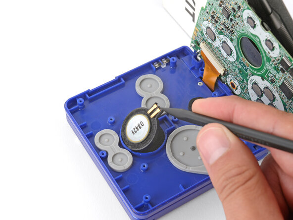 Nintendo Game Boy Advance SP Speaker Replacement, Remove the speaker: crwdns2935265:010crwdnd2935265:02crwdnd2935265:03crwdne2935265:0