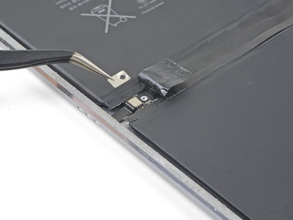 iPad Pro 9.7" Battery Replacement, Remove the screw securing the smart connector cable cover: step 100, image 2 of 2