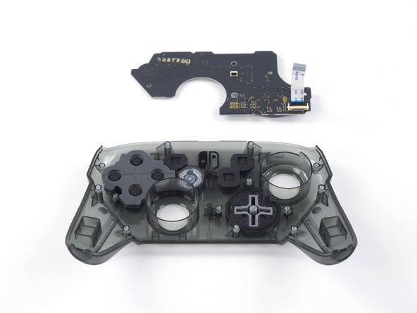 Nintendo Switch Pro Controller Front Button Replacement, Remove the board: crwdns2935265:017crwdnd2935265:02crwdnd2935265:02crwdne2935265:0