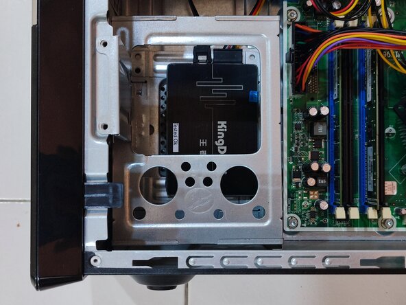 Hard Drive Replacement, Remove the screws securing the hard drive bracket: step 2, image 2 of 2