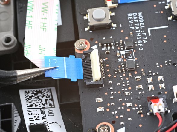 Steam Deck Speakers Replacement, Disconnect the button  board interconnect cable: crwdns2935265:025crwdnd2935265:03crwdnd2935265:03crwdne2935265:0