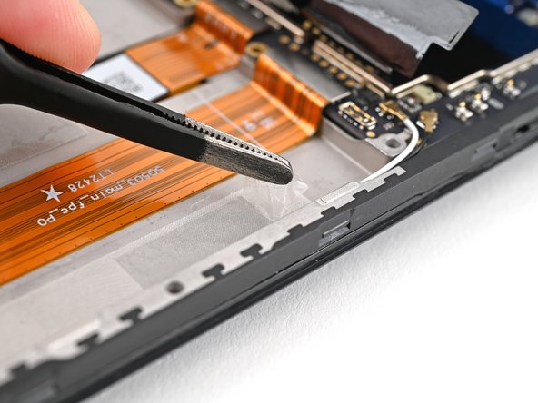 HMD Fusion Business Battery Replacement, Remove the battery adhesive: crwdns2935265:014crwdnd2935265:02crwdnd2935265:03crwdne2935265:0