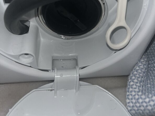 How to Clean the Filter of a GE 24" Front-Loading Washing Machine: step 3, image 1 of 1