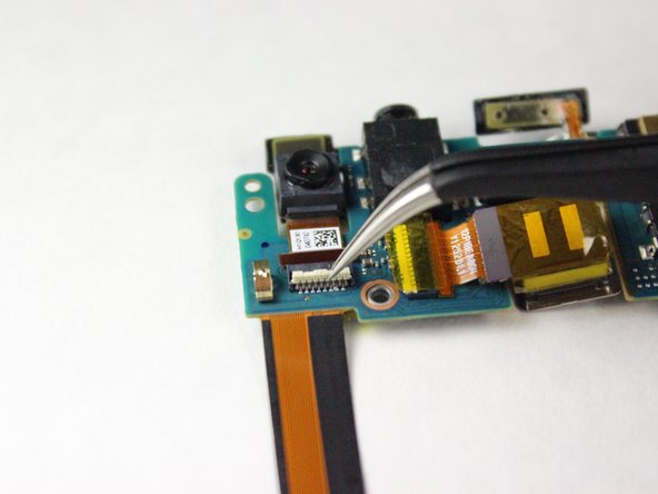 HTC Droid DNA Front-Facing Camera Replacement, Release the White Connector Clip: crwdns2935265:029crwdnd2935265:02crwdnd2935265:02crwdne2935265:0