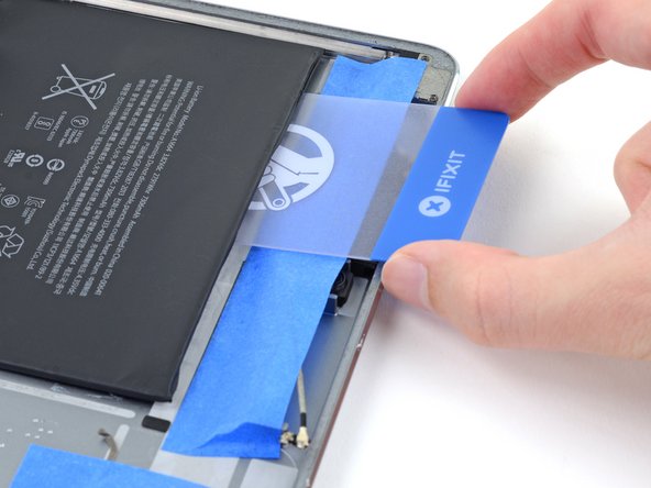 iPad Pro 9.7" Battery Replacement, Slice through the adhesive strip: step 118, image 3 of 3
