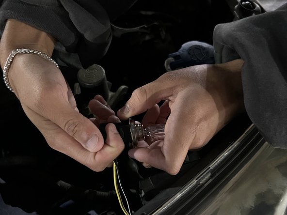 2014 Hyundai Veloster Headlight Replacement: step 5, image 2 of 3