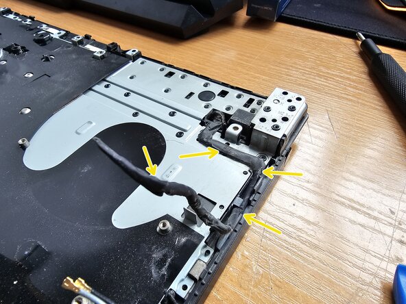 Lenovo Legion Y530-15ICH Upper Case with Keyboard Replacement, Unscrew the hinge and free the cable: crwdns2935265:019crwdnd2935265:02crwdnd2935265:03crwdne2935265:0