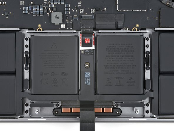 MacBook Pro 14" Late 2023 (M3) Battery Replacement, Unfasten the trackpad: crwdns2935265:022crwdnd2935265:02crwdnd2935265:02crwdne2935265:0