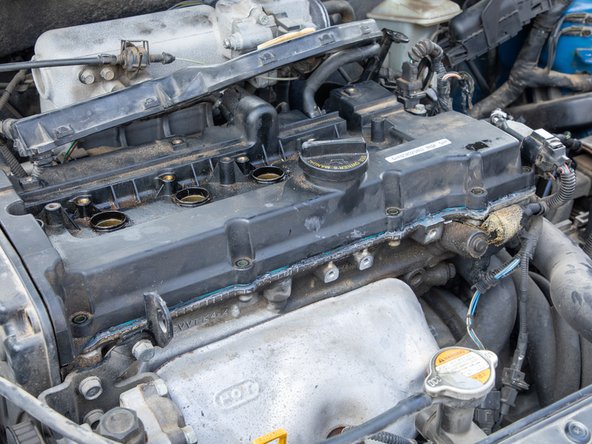 2006 Kia Rio Engine Valve Cover Gasket Replacement: crwdns2935265:018crwdnd2935265:03crwdnd2935265:03crwdne2935265:0