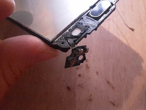Samsung Galaxy A510F, remplacement du PCB USB, jack et boutons, Décoller les contacts des boutons côté vitre: crwdns2935265:024crwdnd2935265:02crwdnd2935265:02crwdne2935265:0