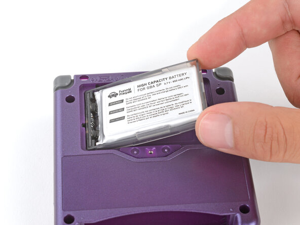 How to Reshell Your Game Boy Advance SP, Install the battery: crwdns2935265:066crwdnd2935265:02crwdnd2935265:03crwdne2935265:0