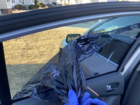 Removing Aftermarket Vehicle Window Tinting: crwdns2935265:07crwdnd2935265:02crwdnd2935265:02crwdne2935265:0