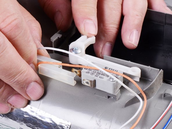 LG Refrigerator LFX25973 Display Board Replacement, Disconnect the ice dispensing switch: crwdns2935265:014crwdnd2935265:02crwdnd2935265:02crwdne2935265:0