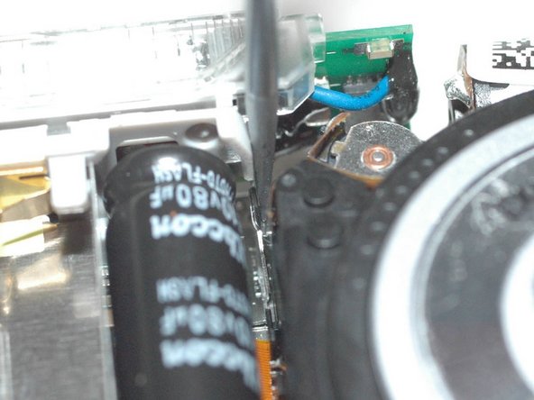 Repairing Casio Exilim EX-Z350 Lens mechanics, Remove metal frame bracket (1): crwdns2935265:08crwdnd2935265:03crwdnd2935265:03crwdne2935265:0