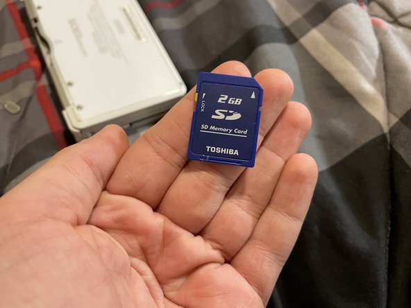 A Jammed SD Card Tray, Remove sd card: crwdns2935265:04crwdnd2935265:03crwdnd2935265:03crwdne2935265:0