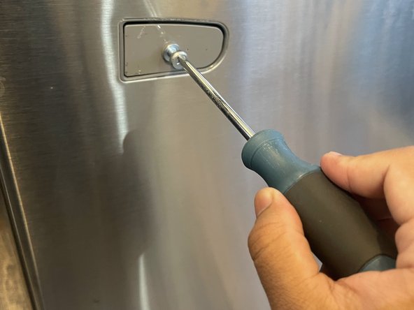 Samsung RF263BEAESR Freezer Door Handle Replacement: step 3, image 2 of 3