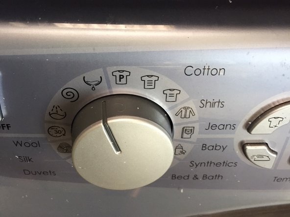 Remove and replace cycle select knob, remove knob cover piece: step 1, image 2 of 2