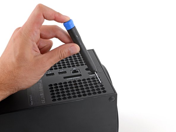 Xbox Series X 2TB Galaxy Black Base Replacement, Unlatch the base: crwdns2935265:01crwdnd2935265:02crwdnd2935265:03crwdne2935265:0