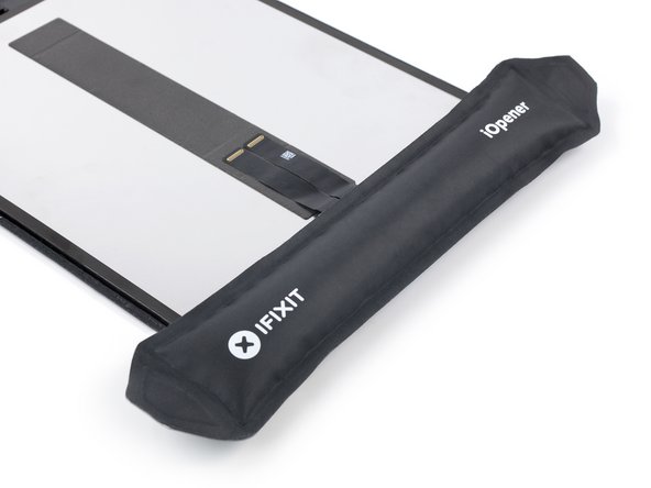 iPad Pro 12.9" 2nd Gen Screen Replacement, Loosen the home button bracket adhesive.: crwdns2935265:041crwdnd2935265:03crwdnd2935265:03crwdne2935265:0