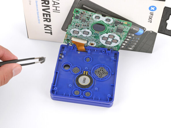 Nintendo Game Boy Advance SP Buttons Replacement, Remove the buttons: crwdns2935265:013crwdnd2935265:01crwdnd2935265:03crwdne2935265:0