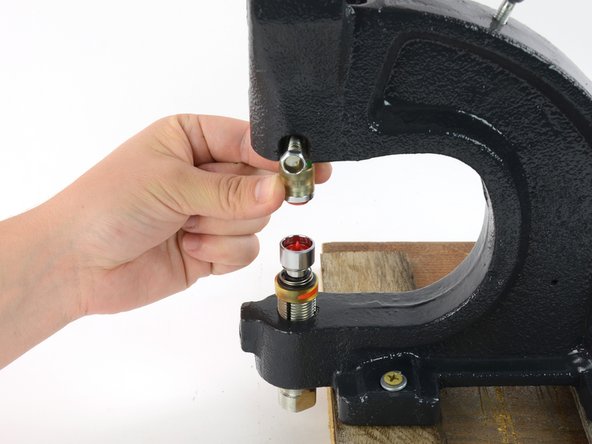 Plastic Snap Installation Using a Hand Press, Set up the hand press: crwdns2935265:07crwdnd2935265:02crwdnd2935265:02crwdne2935265:0