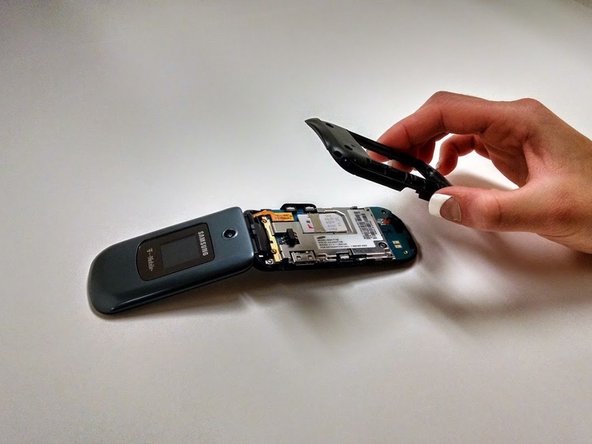 Samsung T139 Pad Buttons Replacement, Remove Black Plastic Cover: crwdns2935265:04crwdnd2935265:03crwdnd2935265:03crwdne2935265:0