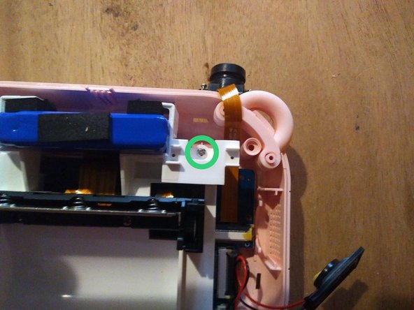 Fix the MyFirst Camera Insta 2 charge issue, Remove the cartridge-holding piece: crwdns2935265:04crwdnd2935265:03crwdnd2935265:03crwdne2935265:0