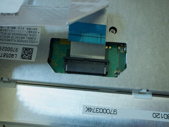 Porsche 997.1 PCM 2.1 Screen Replacement, Disconnect the screen ribbon cable: step 15, image 1 of 1