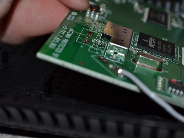 Disassembling the Linksys E1200: crwdns2935265:04crwdnd2935265:03crwdnd2935265:03crwdne2935265:0