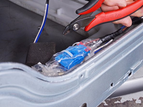 LG Front Load Washing Machine Drain Pump Motor Replacement, Unwrap the pump assembly cables: crwdns2935265:029crwdnd2935265:03crwdnd2935265:03crwdne2935265:0