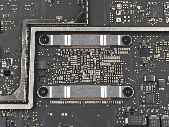 How to Replace the Thermal Paste in your Mac mini (2024), Remove the heat sink bracket screws: step 49, image 3 of 3