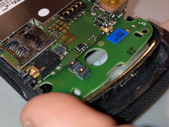 Motorola MOTOACTIV W450 Teardown, Circuit Board: crwdns2935265:07crwdnd2935265:03crwdnd2935265:03crwdne2935265:0