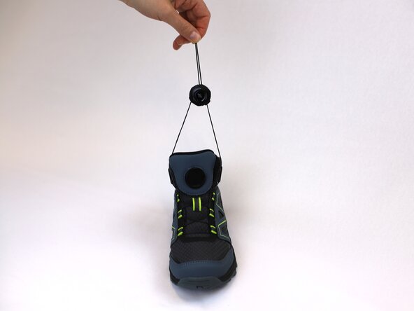 How to Replace a Dial-Lace System in a Hiking Boot, Tighten the lace: crwdns2935265:016crwdnd2935265:02crwdnd2935265:03crwdne2935265:0