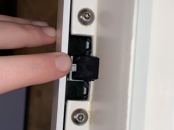 How to Fix a Whirlpool WDF330PAHW Door Latch: step 3, image 2 of 2