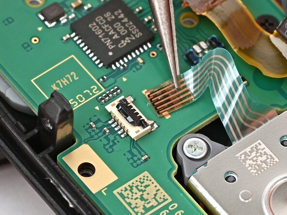 Joy-Con 2 (Right) Joystick Replacement, Disconnect the board: crwdns2935265:022crwdnd2935265:03crwdnd2935265:03crwdne2935265:0