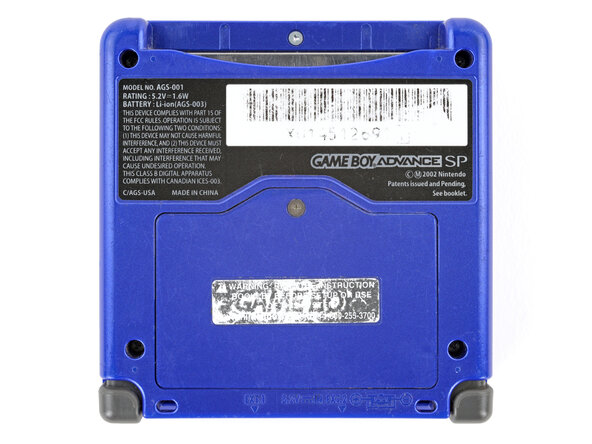 How to Reshell Your Game Boy Advance SP, Remove the battery cover: crwdns2935265:02crwdnd2935265:02crwdnd2935265:02crwdne2935265:0