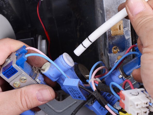 LG Refrigerator Water Inlet Valve Assembly Test and Replacement, Remove the inlet valve assembly: crwdns2935265:010crwdnd2935265:02crwdnd2935265:03crwdne2935265:0