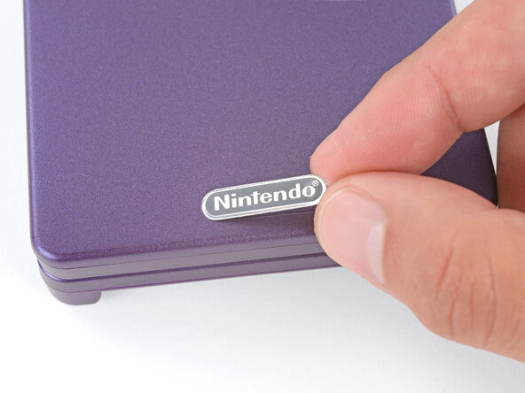 How to Reshell Your Game Boy Advance SP, Apply new stickers: crwdns2935265:069crwdnd2935265:03crwdnd2935265:03crwdne2935265:0