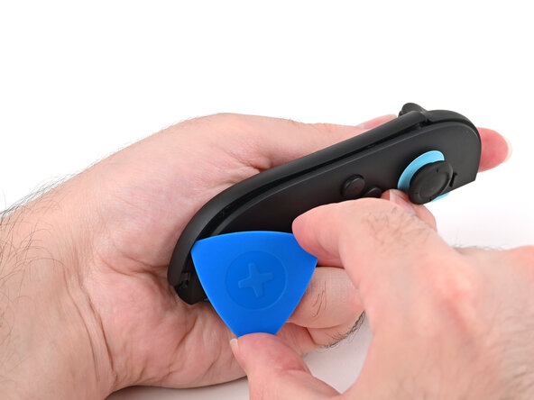 Joy-Con 2 (Left) Battery Replacement, Remove the plastic strip: crwdns2935265:04crwdnd2935265:02crwdnd2935265:03crwdne2935265:0