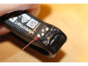 How to change outlet battery in garmin vivofit