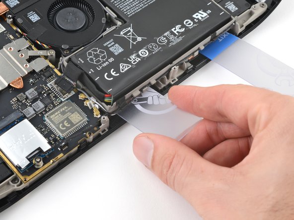 Steam Deck OLED Battery Replacement, Slice the battery adhesive: crwdns2935265:023crwdnd2935265:03crwdnd2935265:03crwdne2935265:0