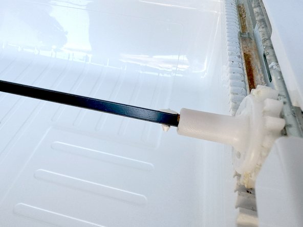 Samsung Older French Door Refrigerator Freezer Drawer Replacement, Release the connector rod retaining pin: crwdns2935265:07crwdnd2935265:02crwdnd2935265:03crwdne2935265:0